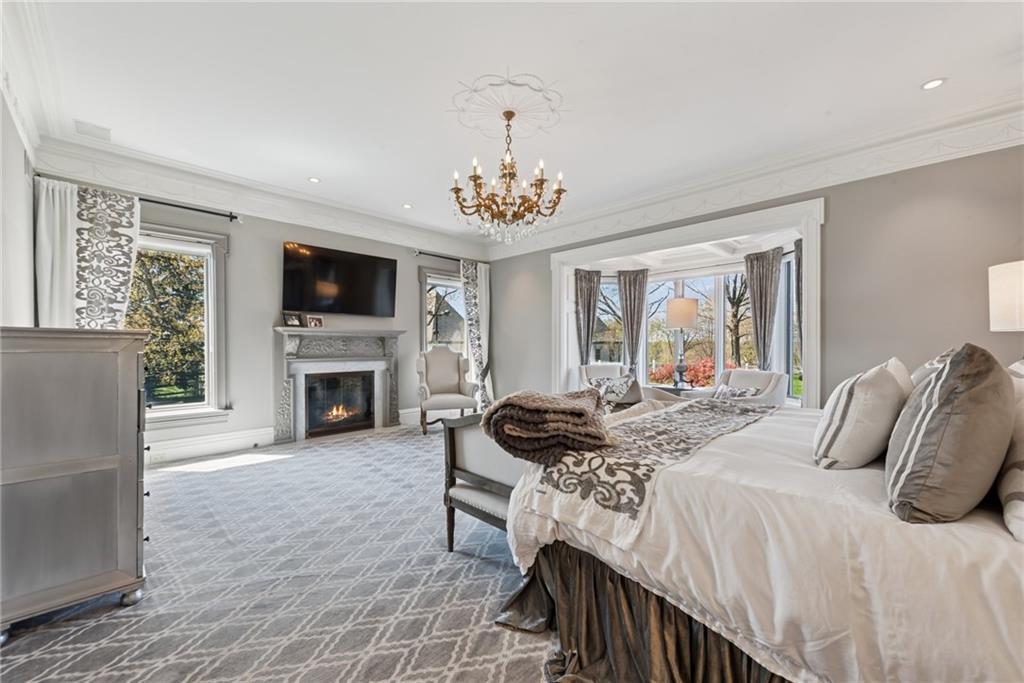 152 Justabout Road Venetia, PA 15367 - Photo 32 of 50 a bedroom with a bed and a fireplace