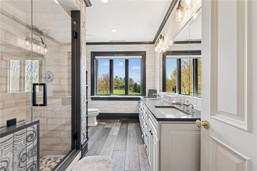 152 Justabout Road Venetia, PA 15367 - Photo 34 of 50 a bathroom with a granite countertop sink and a mirror
