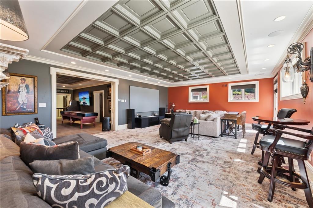 152 Justabout Road Venetia, PA 15367 - Photo 37 of 50 a living room with furniture and a chandelier