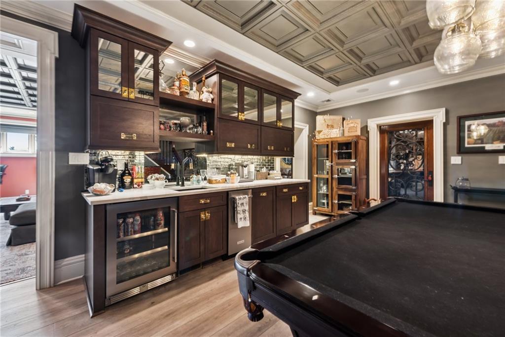 152 Justabout Road Venetia, PA 15367 - Photo 38 of 50 a kitchen with stainless steel appliances granite countertop a large stove a sink dishwasher and cabinets with wooden floor