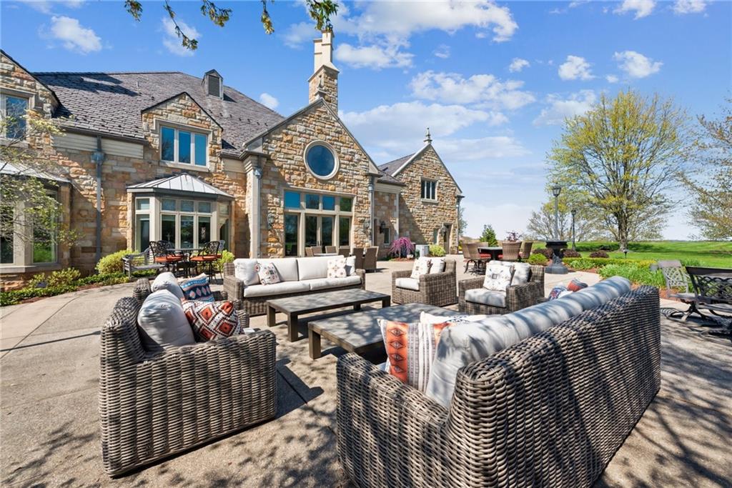 152 Justabout Road Venetia, PA 15367 - Photo 44 of 50 a view of a patio with couches chairs and a fire pit