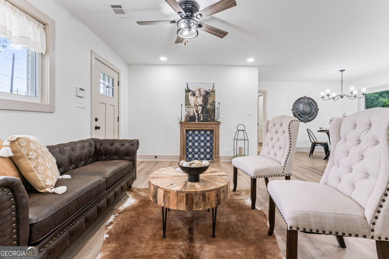 9 Lemon Street McDonough, GA 30253 - Photo 16 of 42 a living room with furniture and a large window