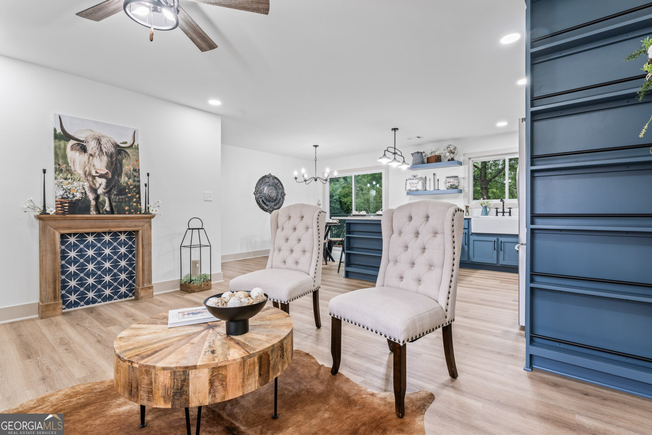 9 Lemon Street McDonough, GA 30253 - Photo 17 of 42 a living room with furniture and wooden floor