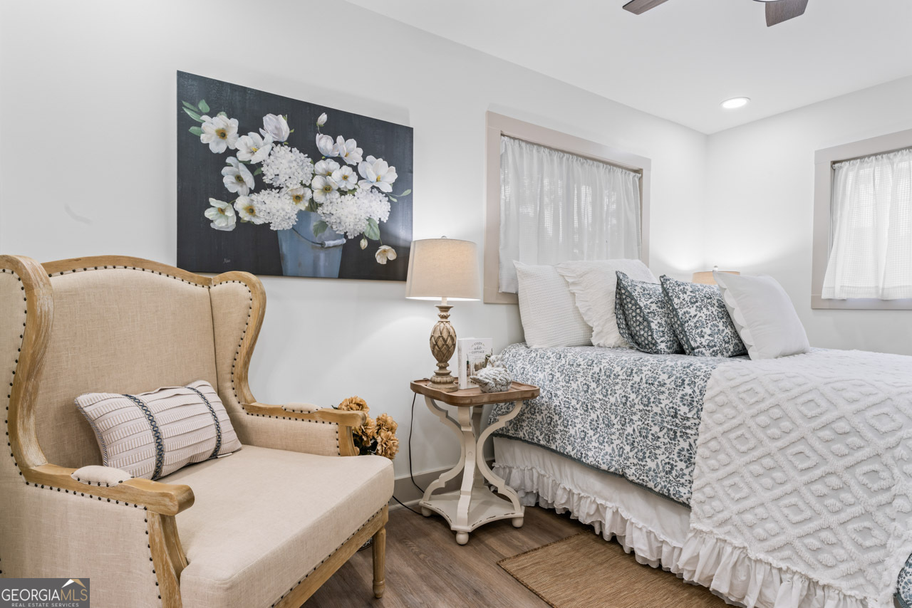 9 Lemon Street McDonough, GA 30253 - Photo 41 of 42 a living room with furniture and wall paintings