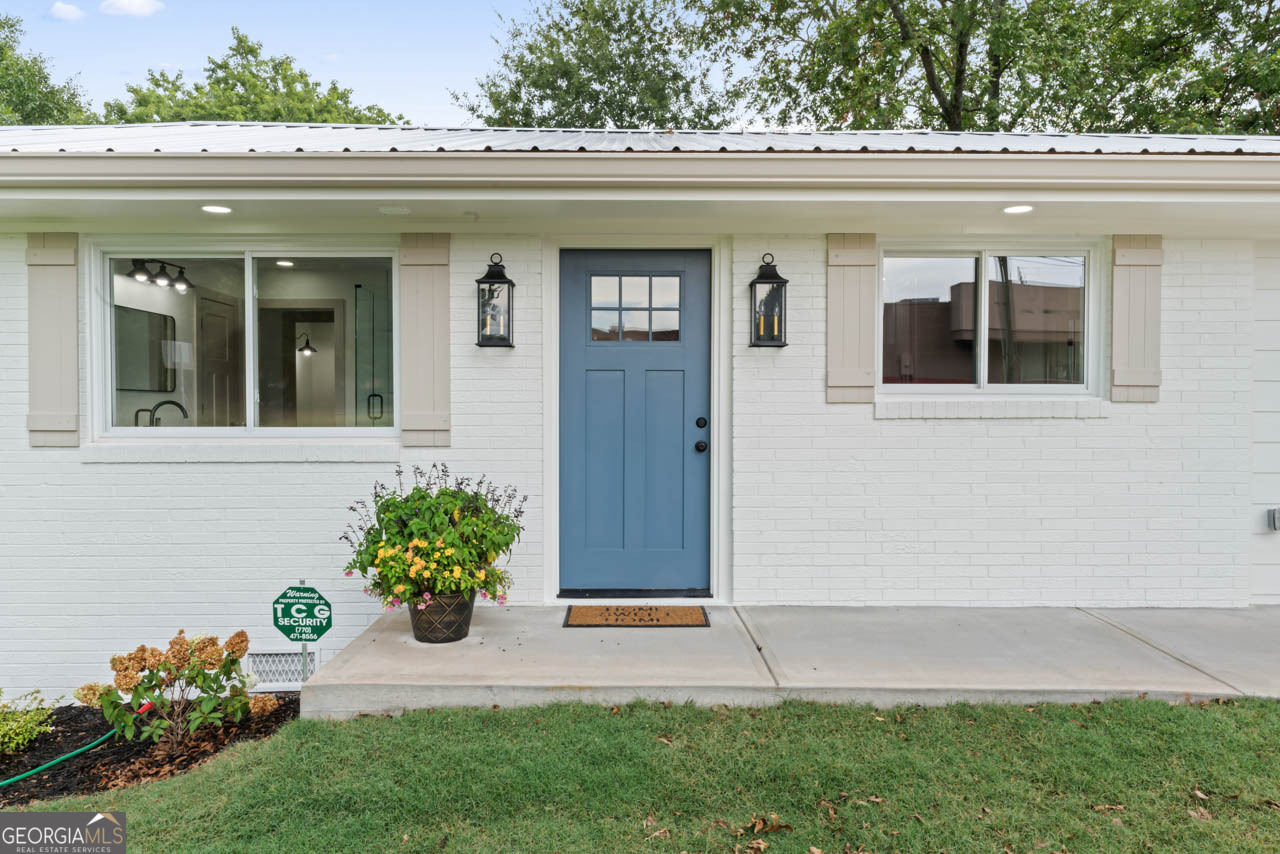9 Lemon Street McDonough, GA 30253 - Photo 9 of 42 a front view of a house with a yard