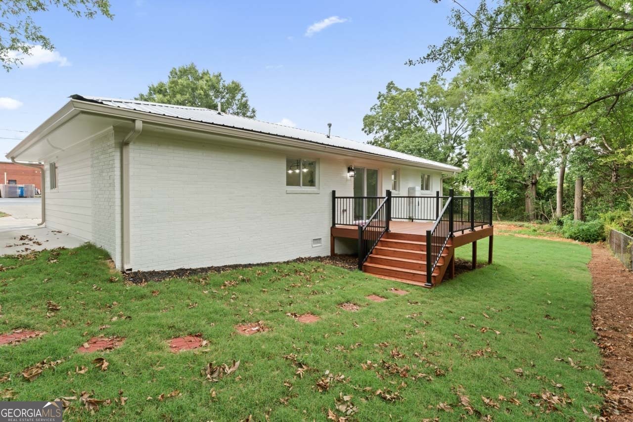 9 Lemon Street McDonough, GA 30253 - Photo 10 of 42 a view of a house with a yard