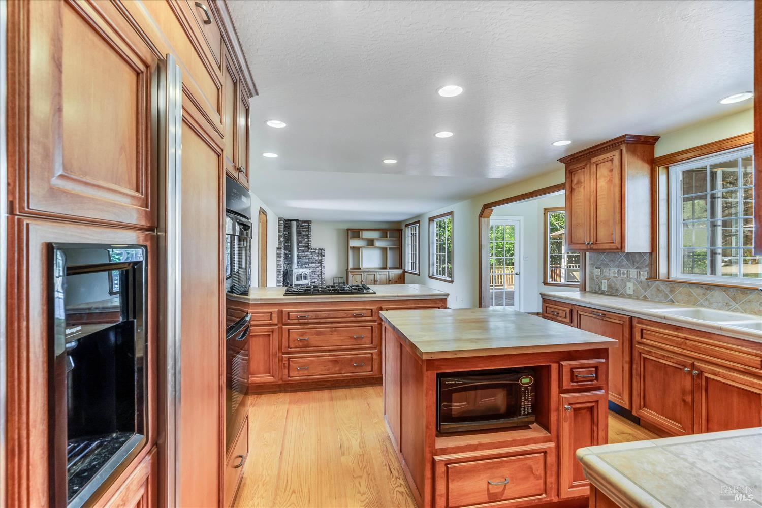 20 Rosedale Road Calistoga, CA 94515 - Photo 14 of 47 a kitchen with stainless steel appliances granite countertop a stove and a sink