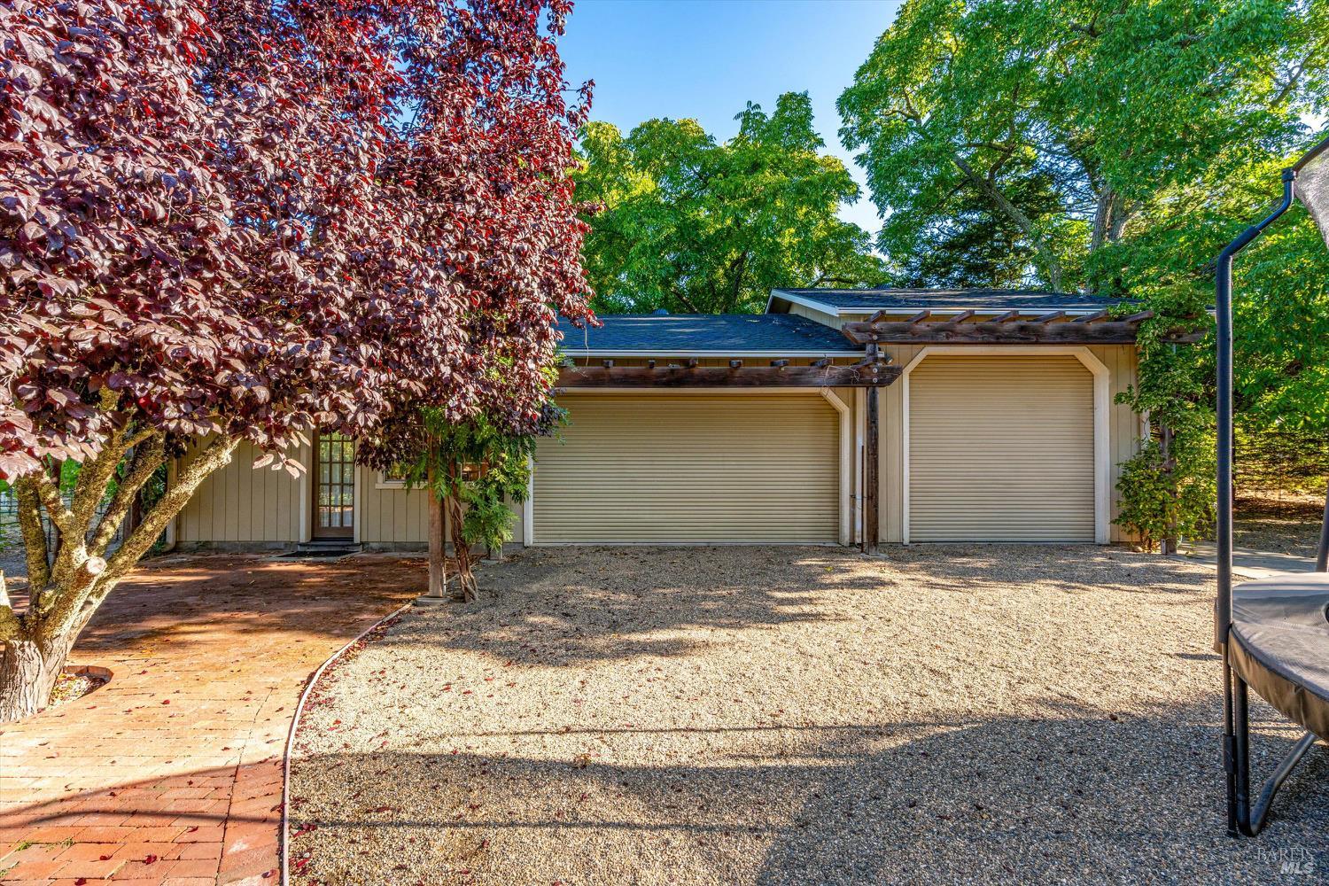 20 Rosedale Road Calistoga, CA 94515 - Photo 45 of 47 a house with trees in front of it