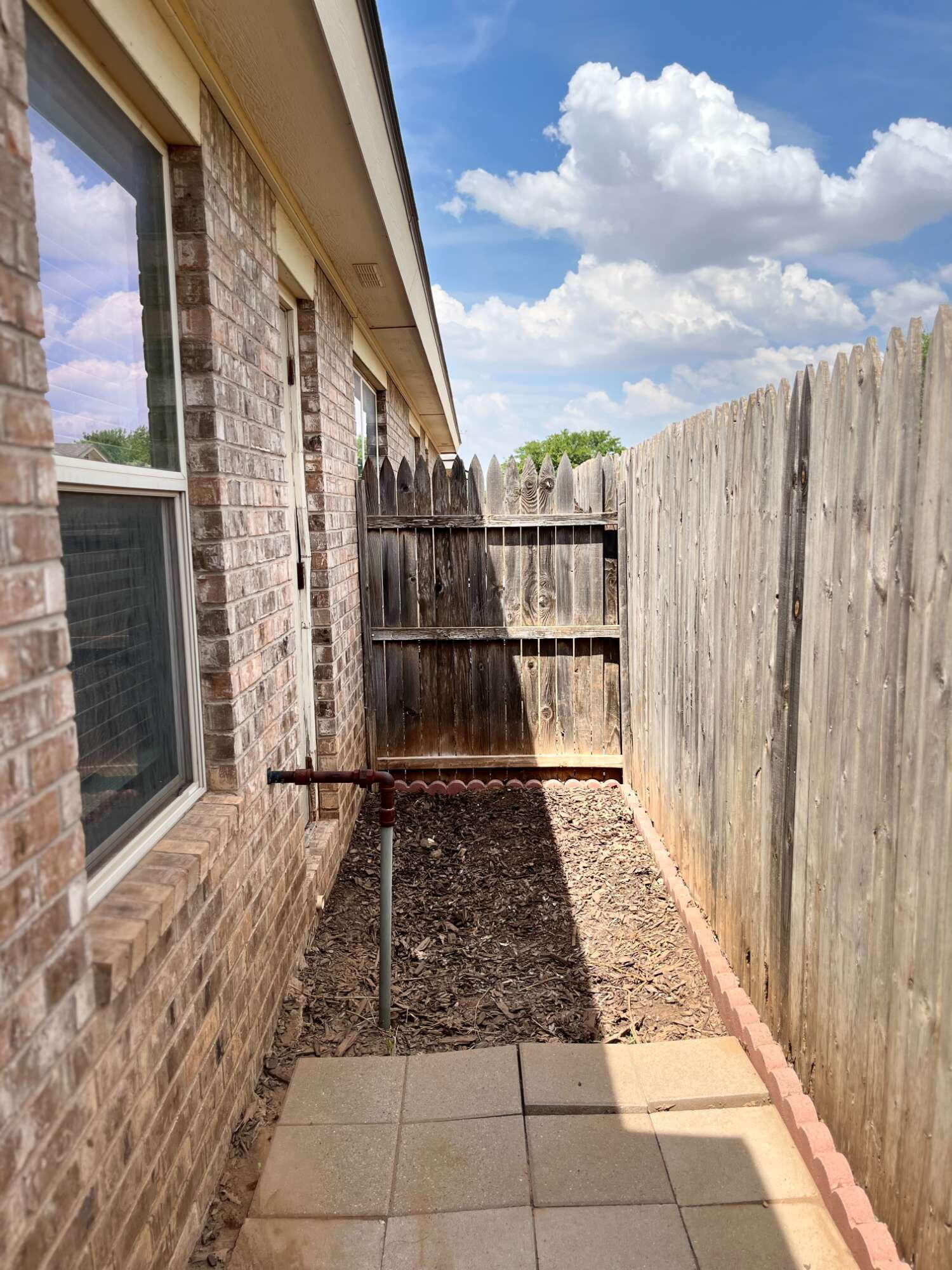 2401 73rd Street, Unit 16 Lubbock, TX 79423 - Photo 17 of 19 a view of a balcony