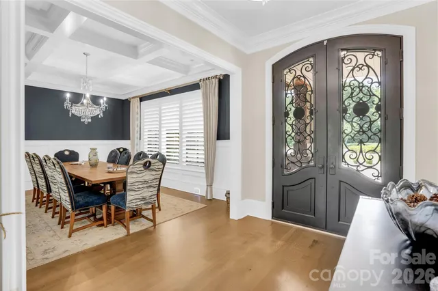 a bathroom with double vanity sinks and a mirror