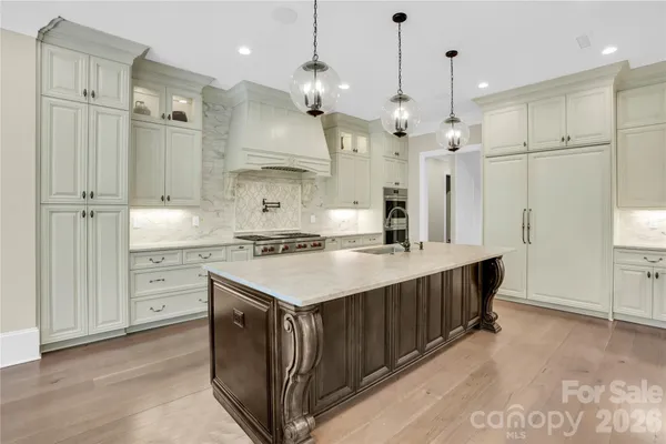 a large kitchen with a large island in it