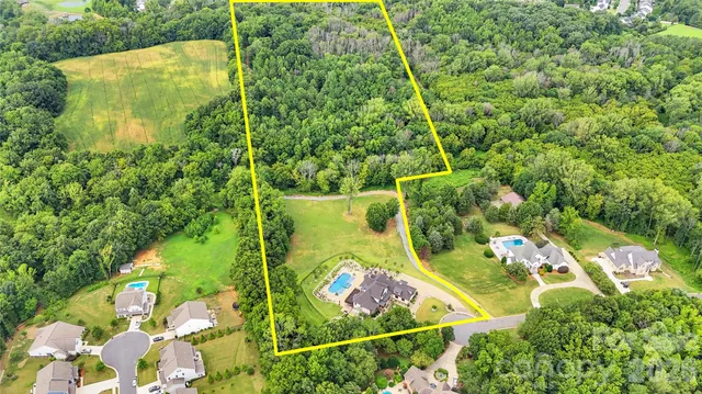 a view of a dining room with furniture and window