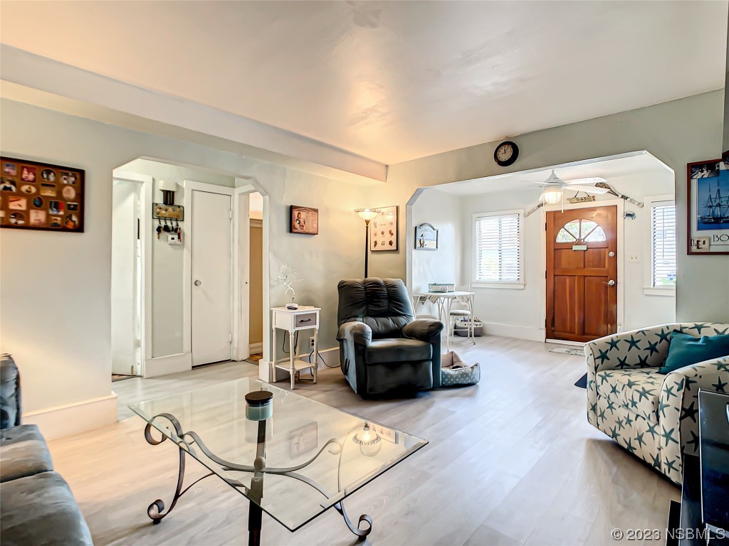 208 Crawford Road New Smyrna Beach, FL 32169 - Photo 15 of 26 a living room with furniture and a window