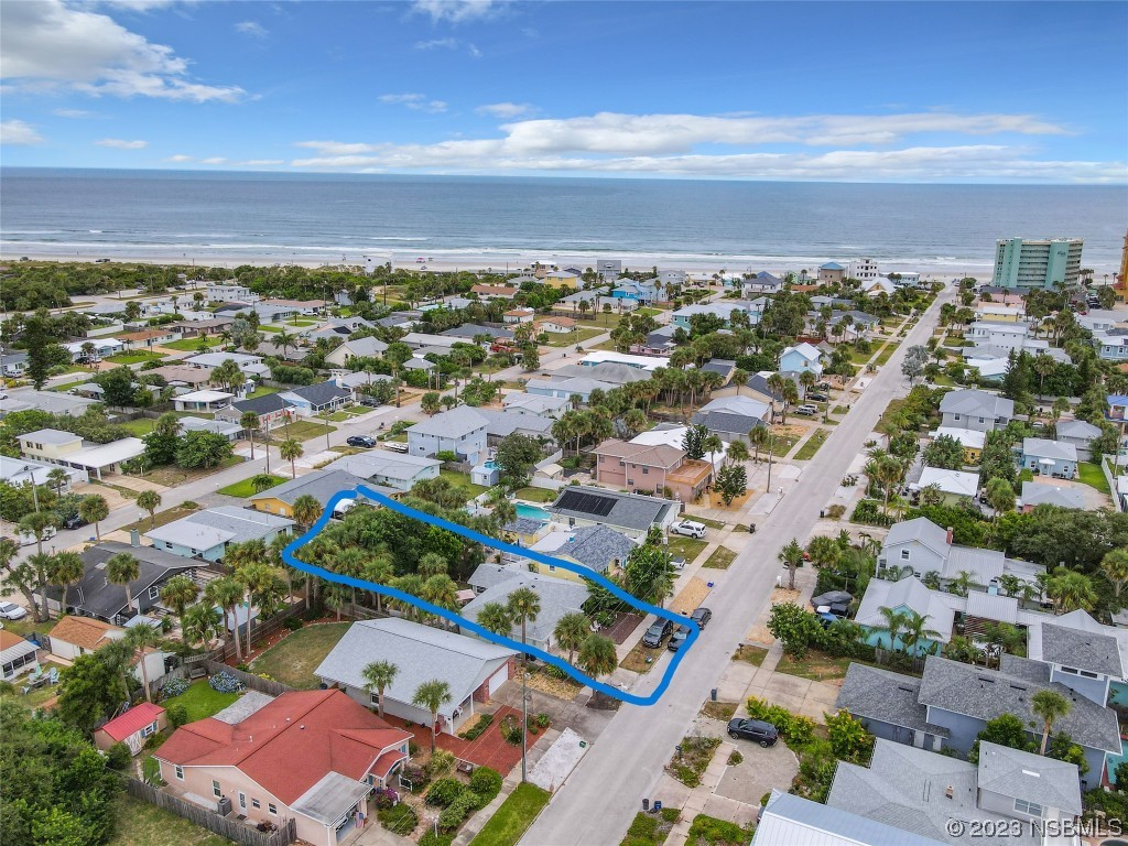 208 Crawford Road New Smyrna Beach, FL 32169 - Photo 21 of 26 an aerial view of residential houses with outdoor space