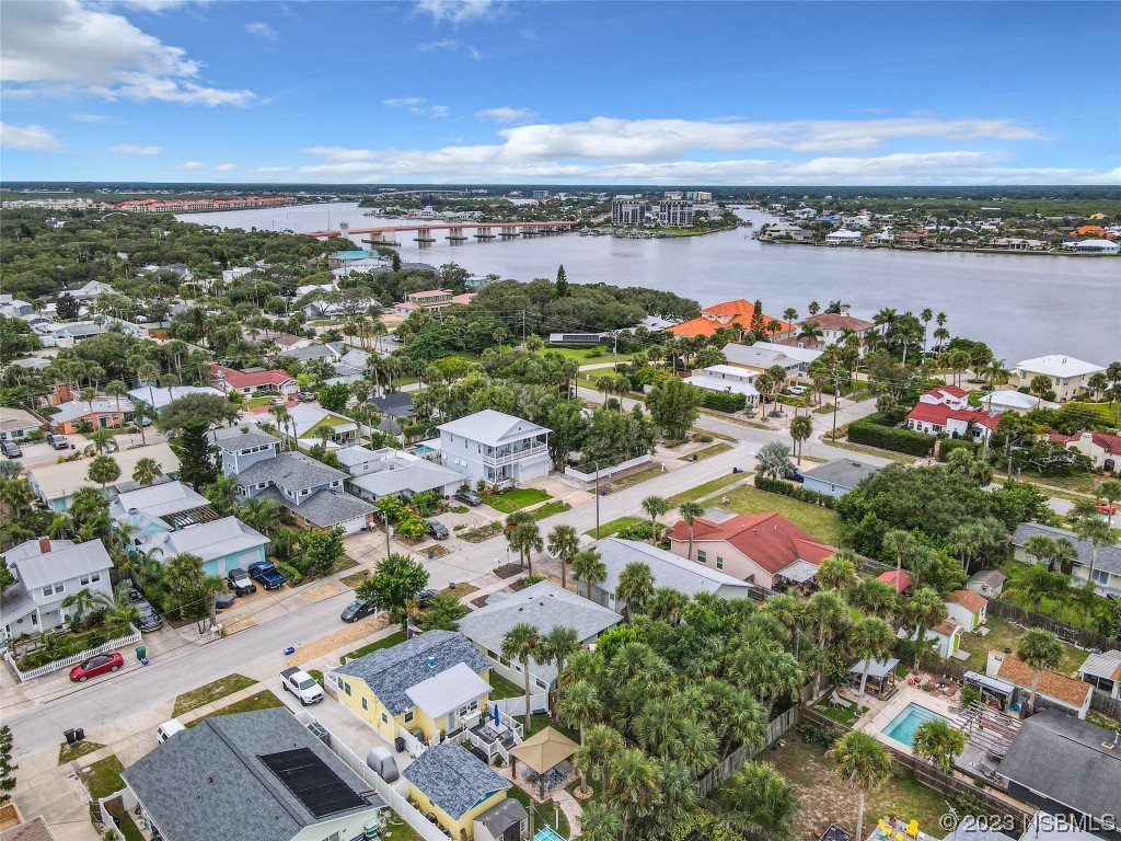 208 Crawford Road New Smyrna Beach, FL 32169 - Photo 22 of 26 an aerial view of a city