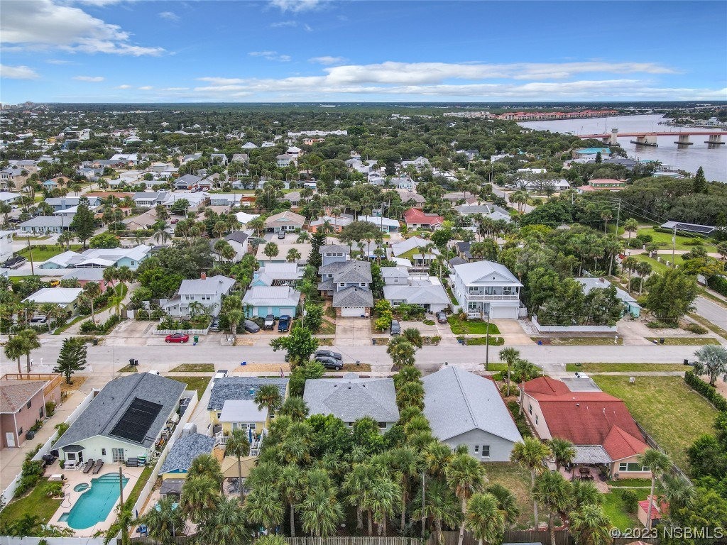 208 Crawford Road New Smyrna Beach, FL 32169 - Photo 23 of 26 an aerial view of residential houses with outdoor space