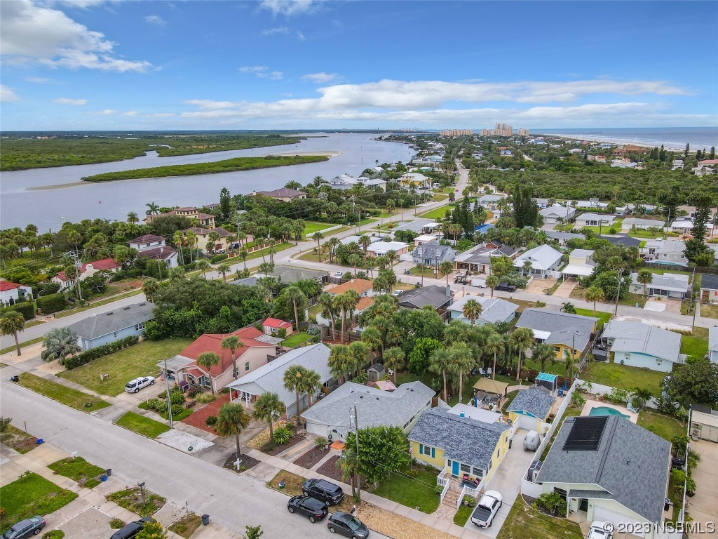 208 Crawford Road New Smyrna Beach, FL 32169 - Photo 24 of 26 an aerial view of a city