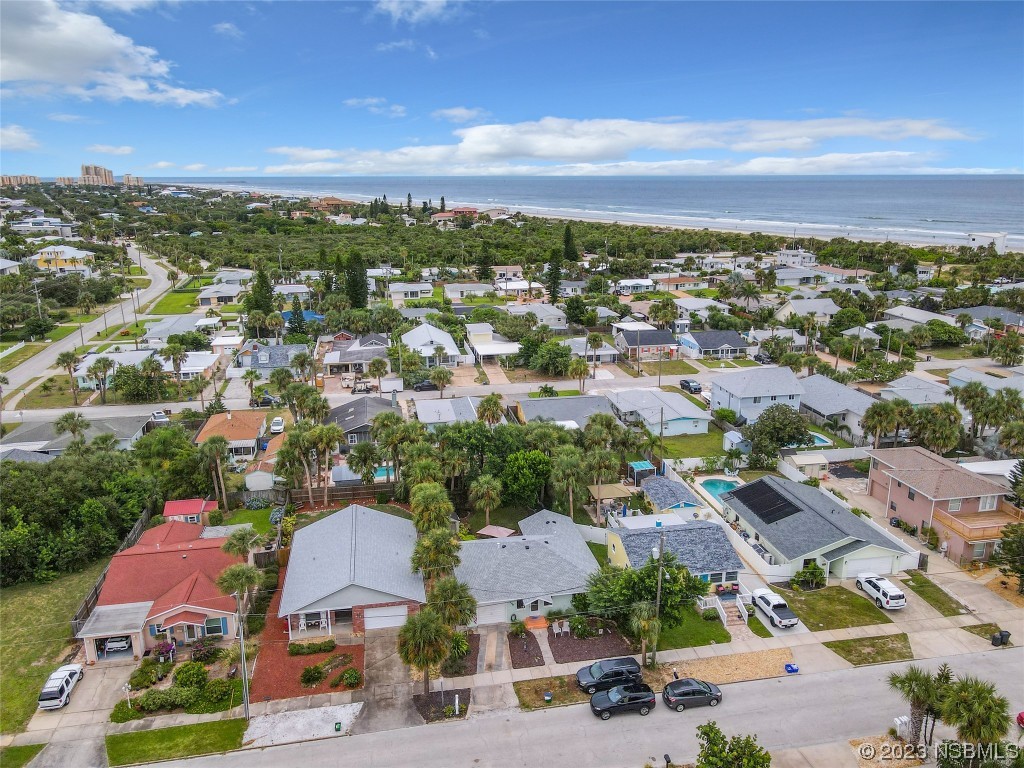 208 Crawford Road New Smyrna Beach, FL 32169 - Photo 25 of 26 an aerial view of residential houses with outdoor space