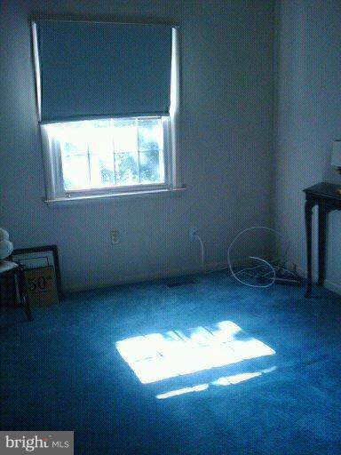6473 Rockshire Court Alexandria, VA 22315 - Photo 11 of 12 a view of an empty room with a window