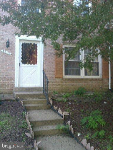 6473 Rockshire Court Alexandria, VA 22315 - Photo 12 of 12 a front view of a house with garden