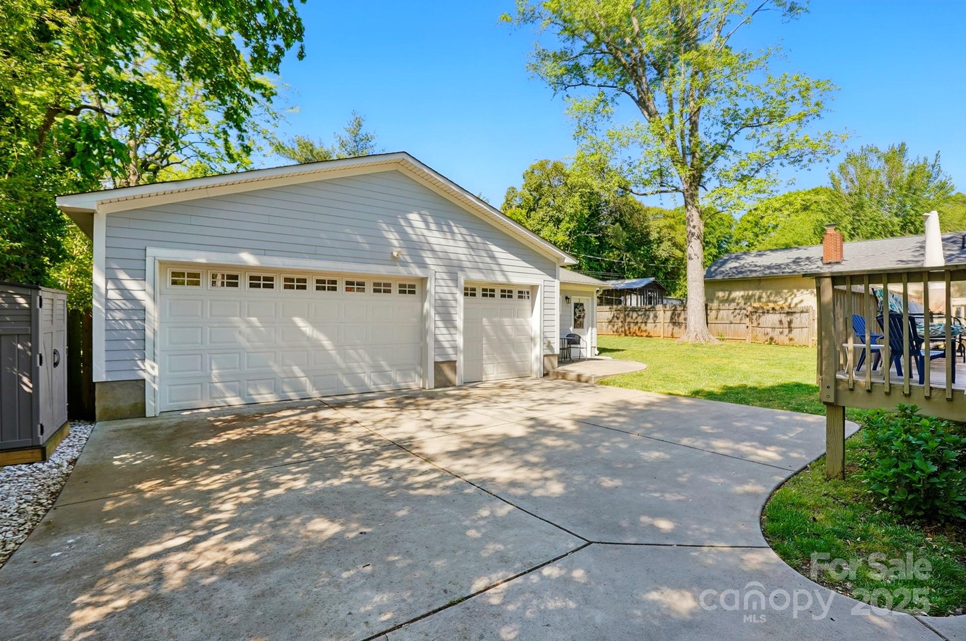 576 Scaleybark Road Charlotte, NC 28209 - Photo 28 of 29 a view of a house with a yard