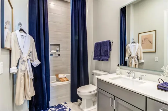 a view of swimming pool with a slide and bench