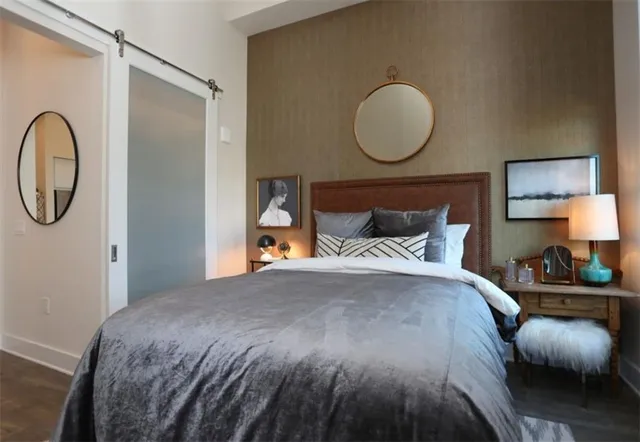 a view of a patio with table and chairs and potted plants