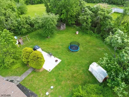 a view of a golf course with a swimming pool