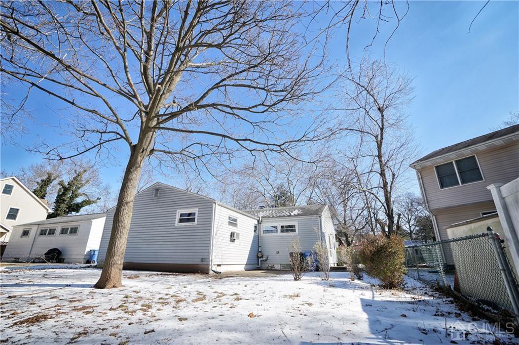 59 Willow Road Metuchen, NJ 08840 - Photo 4 of 23 a front view of a house with a yard