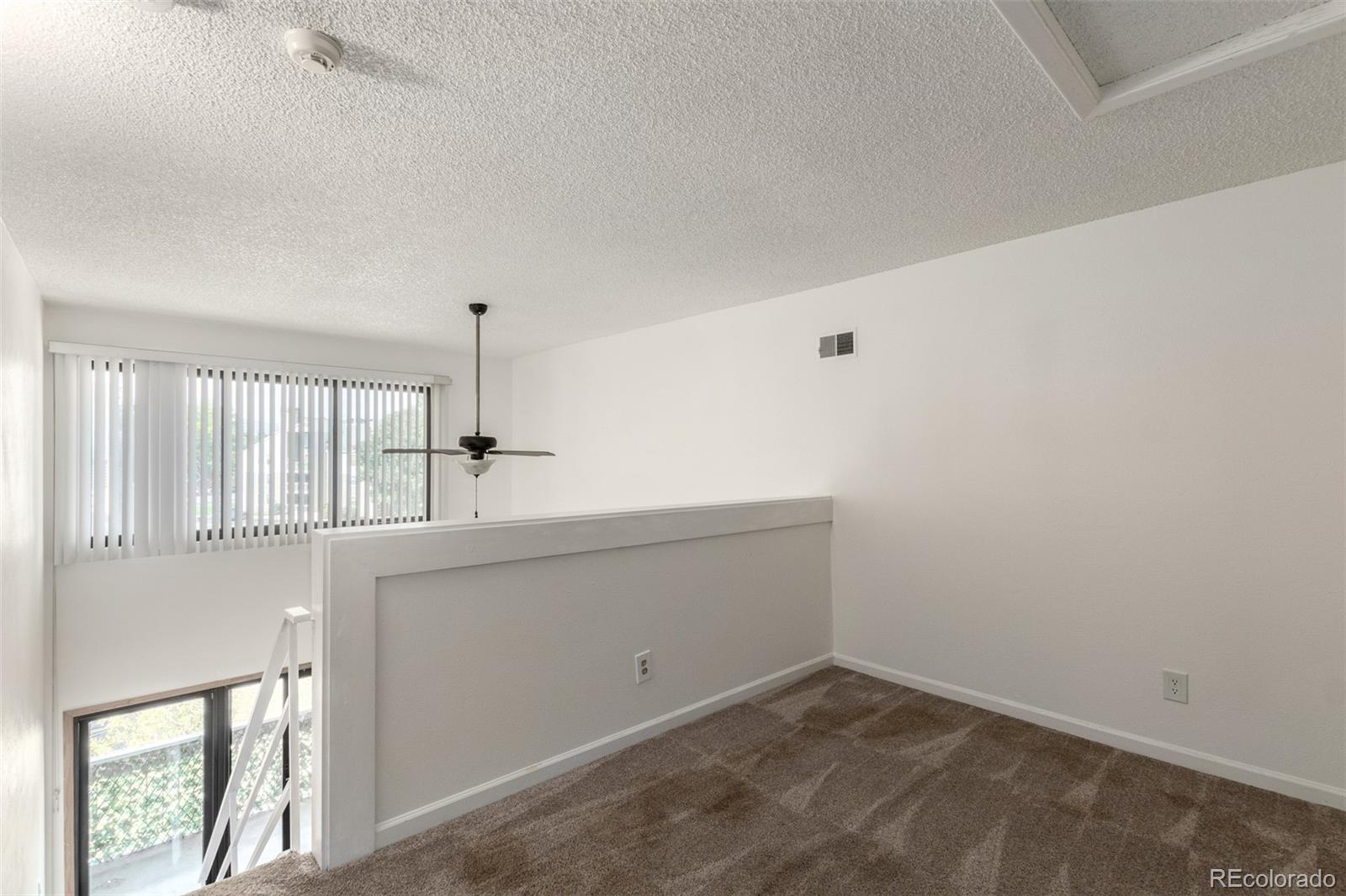 4896 South Dudley Street, Unit 910 Littleton, CO 80123 - Photo 12 of 30 a view of a kitchen with a sink