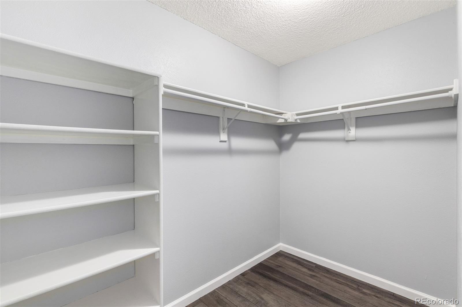 4896 South Dudley Street, Unit 910 Littleton, CO 80123 - Photo 21 of 30 a view of an empty walk in closet