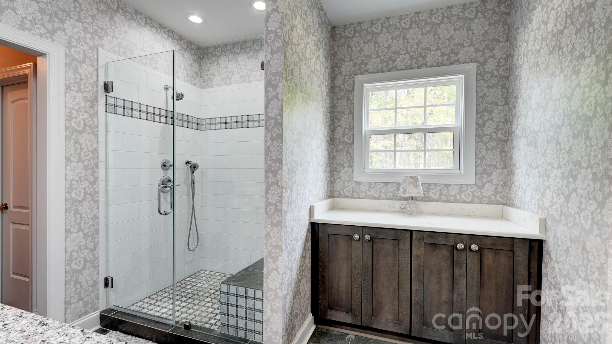 1775 Enochville Road Kannapolis, NC 28081 - Photo 34 of 41 a bathroom with a sink and a mirror