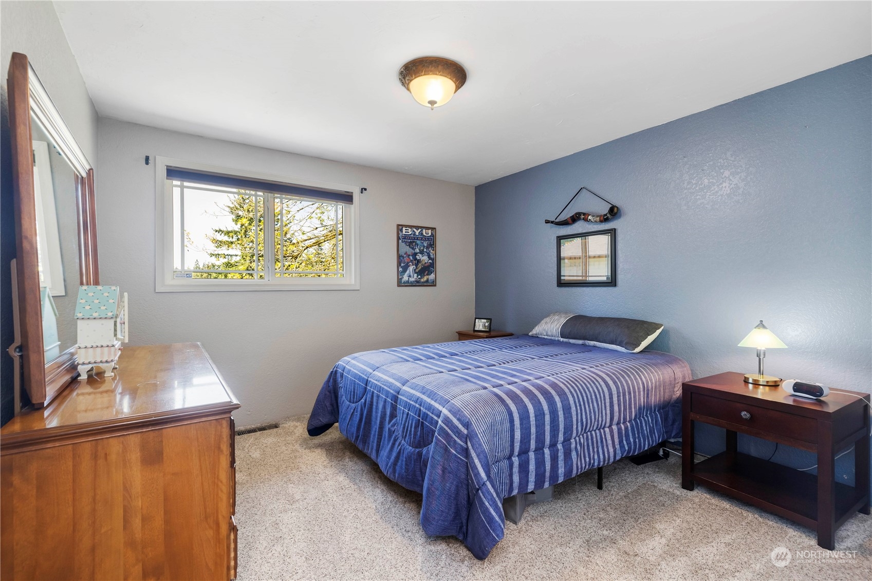 120 221st Street Southwest Bothell, WA 98021 - Photo 22 of 40 a bedroom with bed and a window