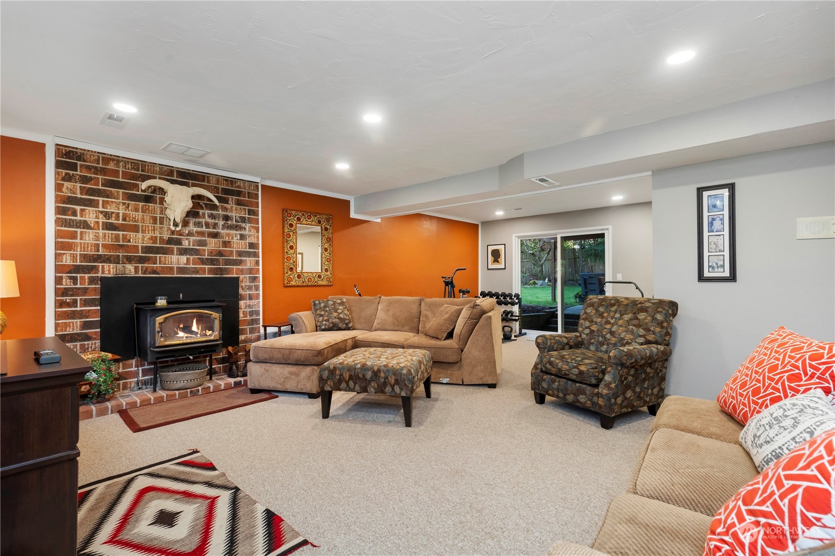 120 221st Street Southwest Bothell, WA 98021 - Photo 26 of 40 a living room with furniture fireplace and a fireplace