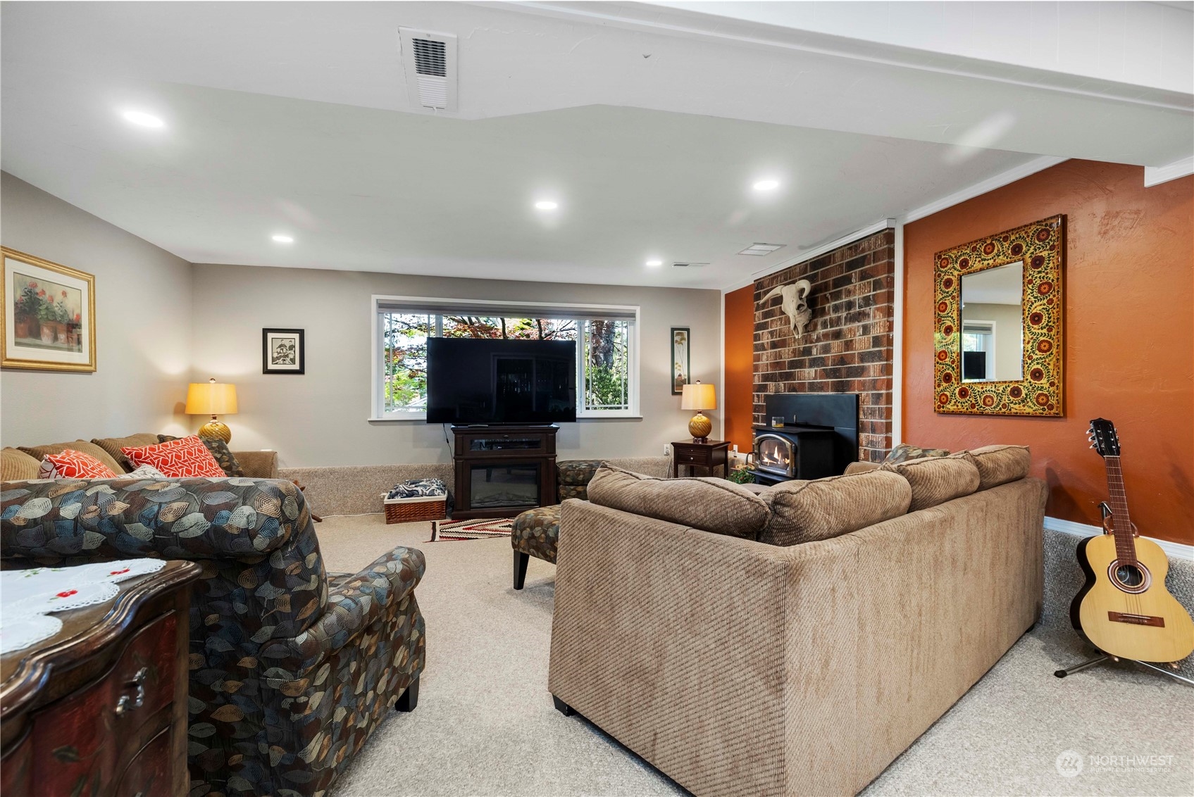120 221st Street Southwest Bothell, WA 98021 - Photo 28 of 40 a living room with furniture and a flat screen tv