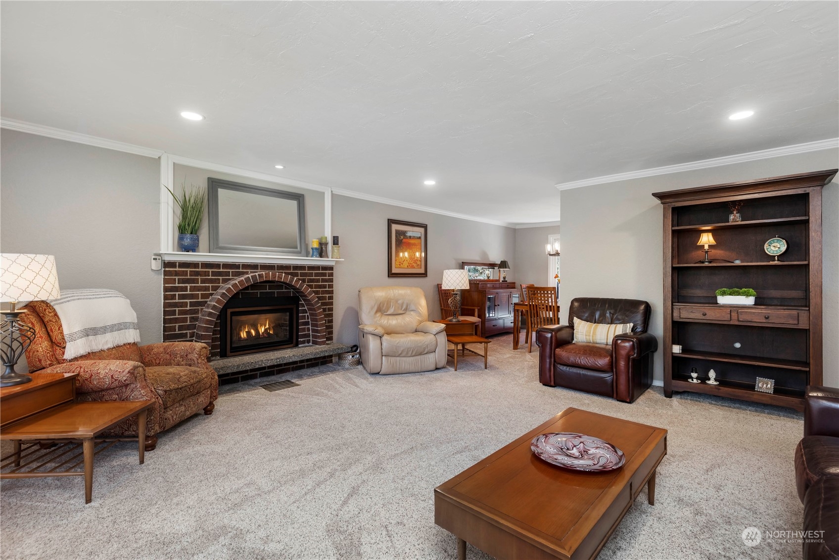 120 221st Street Southwest Bothell, WA 98021 - Photo 10 of 40 a living room with furniture and a fireplace