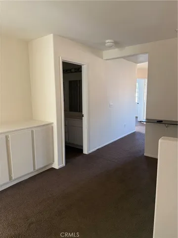 a view of a room with an empty space