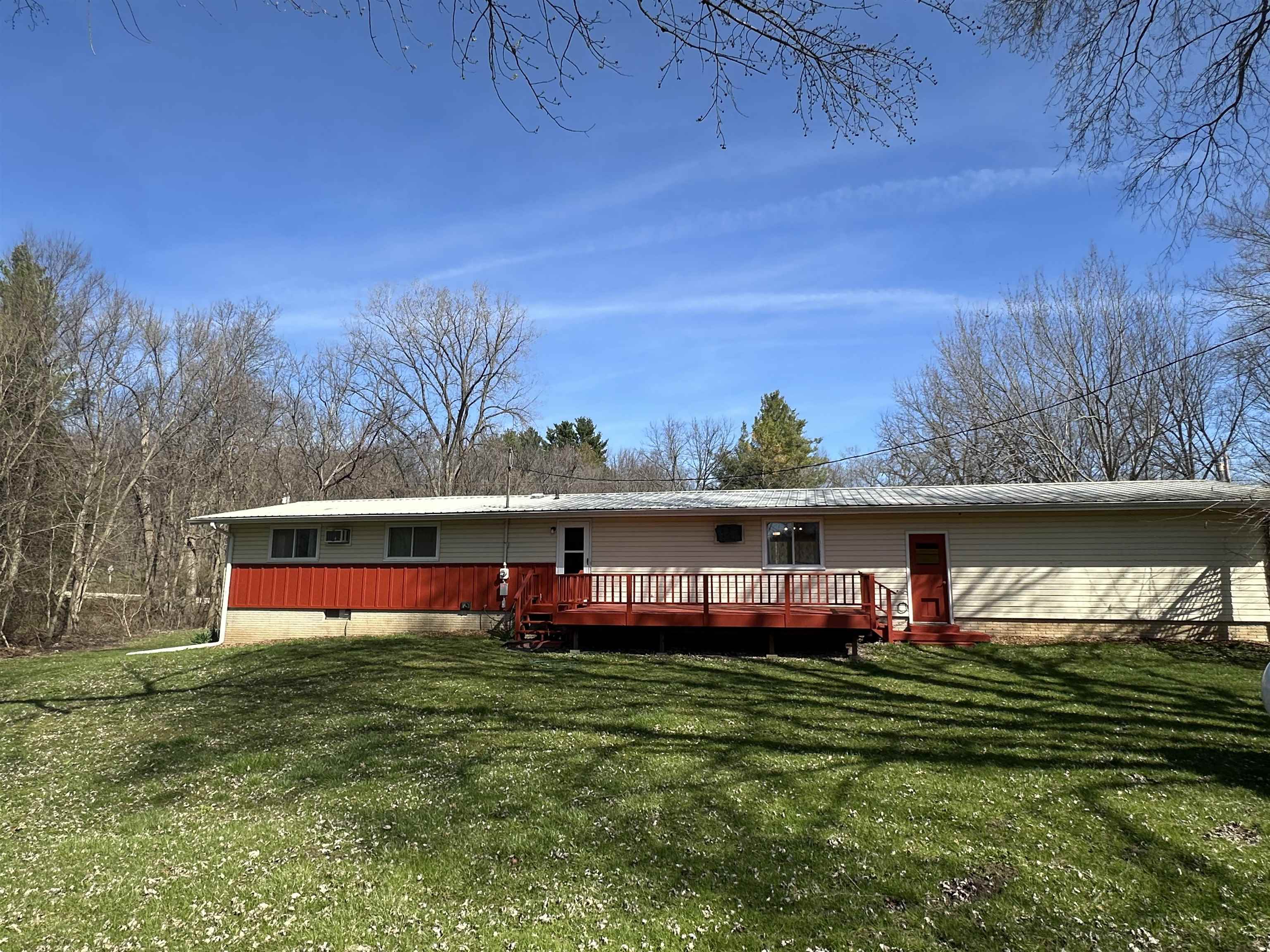 14400-3 3 Mile Road Savanna, IL 61074 - Photo 14 of 19 a view of a swimming pool with an outdoor space and seating area