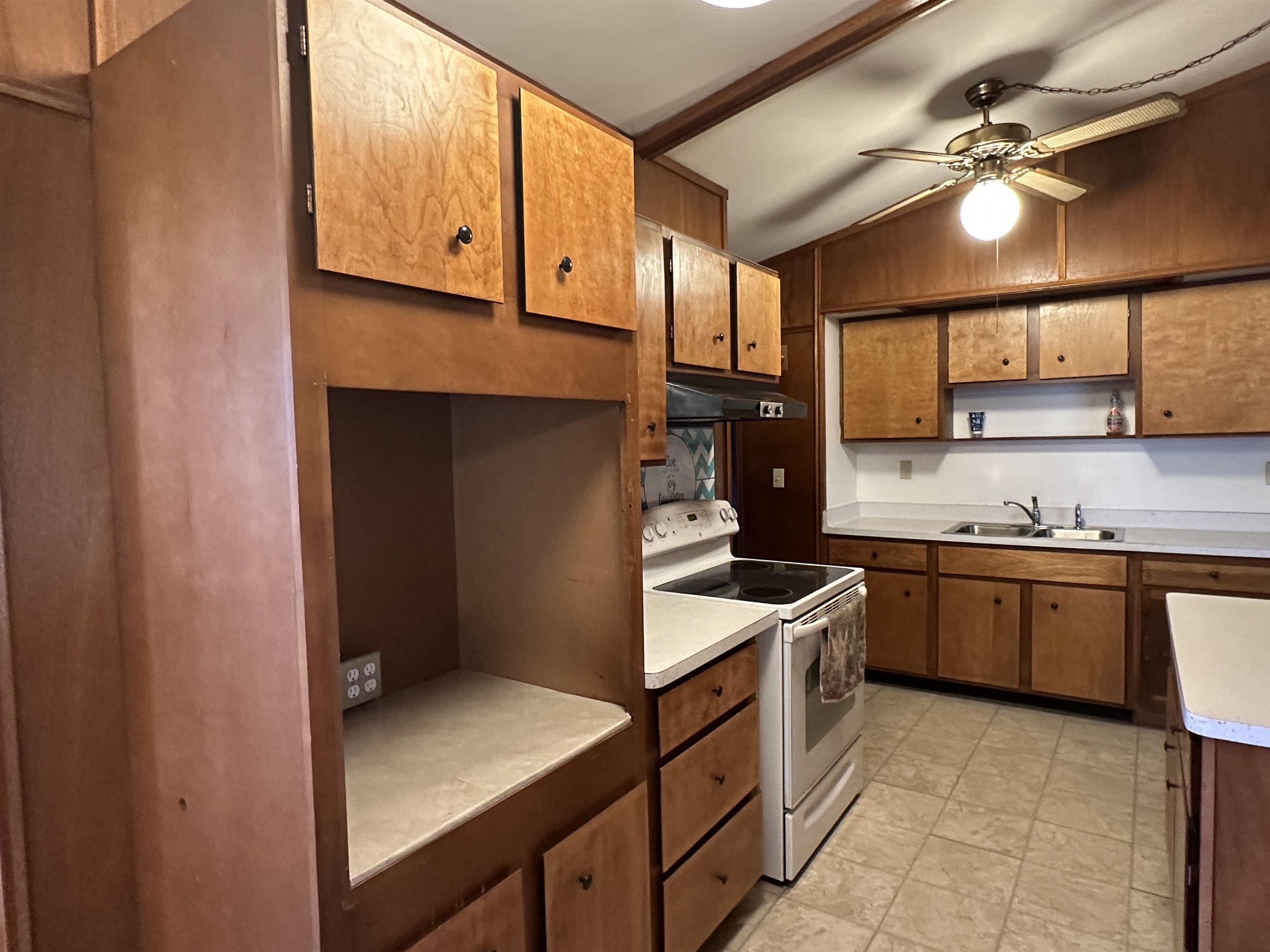 14400-3 3 Mile Road Savanna, IL 61074 - Photo 7 of 19 a kitchen with stainless steel appliances granite countertop a sink and cabinets