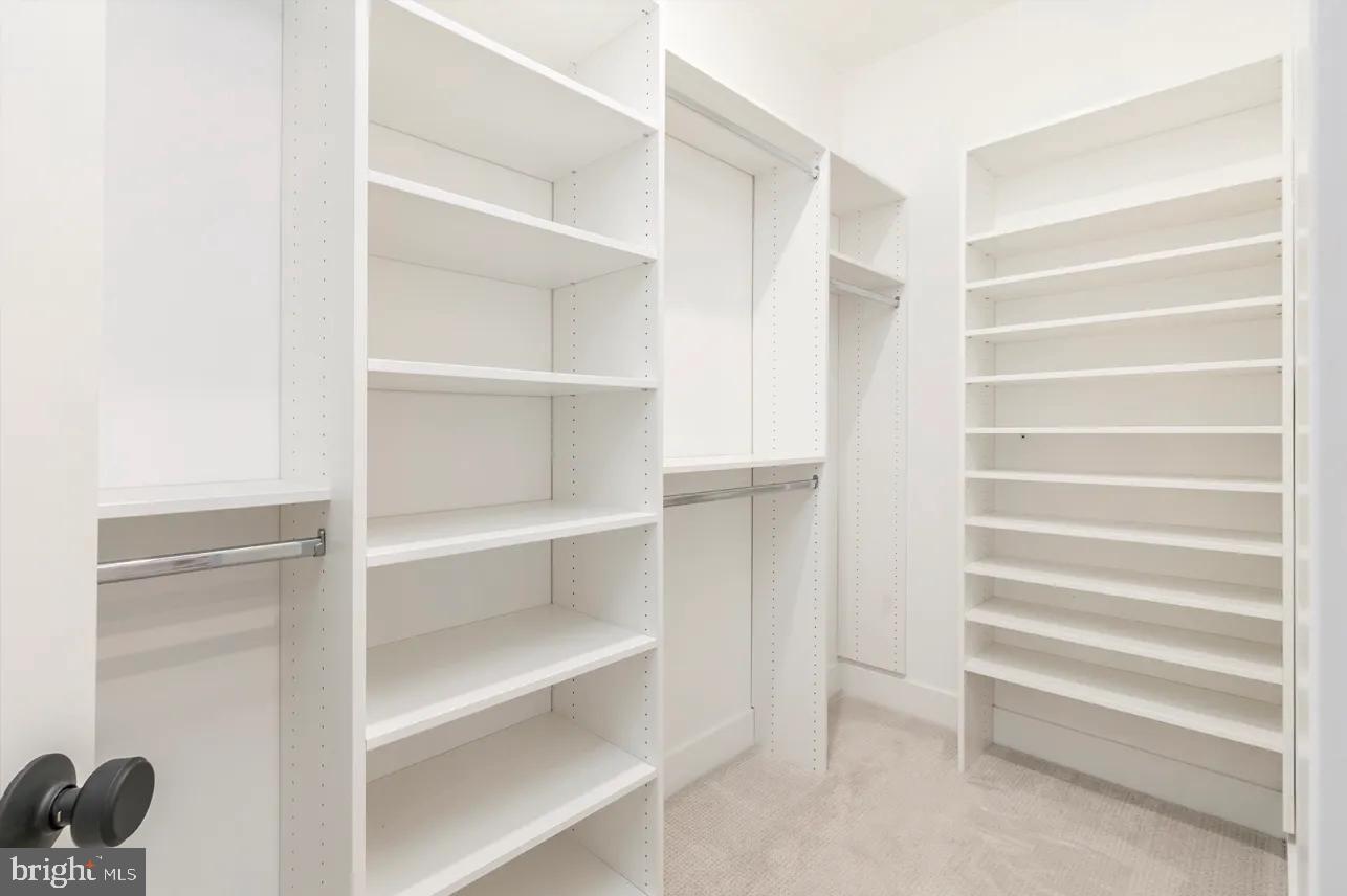 8201 Shawnee Street Philadelphia, PA 19118 - Photo 11 of 22 a view of walk in closet with empty racks
