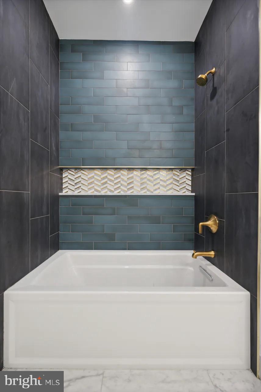 8201 Shawnee Street Philadelphia, PA 19118 - Photo 12 of 22 a bathroom with a bathtub