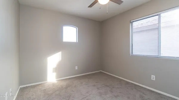 an empty room that has a window