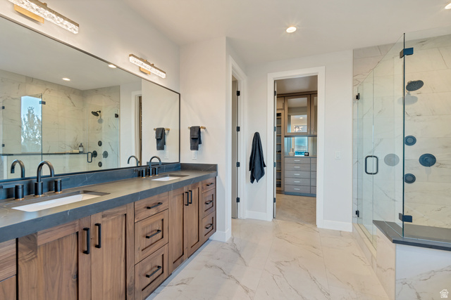 2145 North Main Street Centerville, UT 84014 - Photo 32 of 53 Bathroom with double vanity, a marble finish shower, recessed lighting, and light marble finish floors