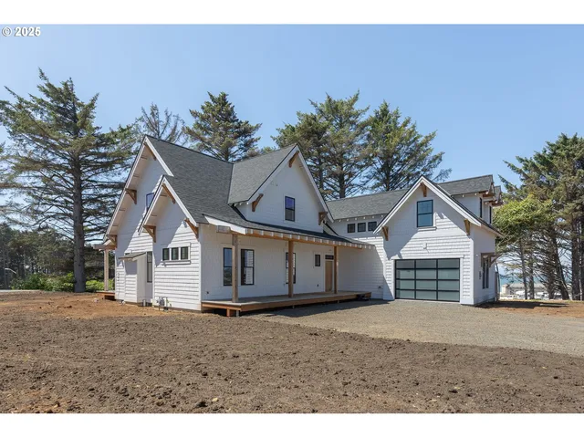 a view of front of house with a yard