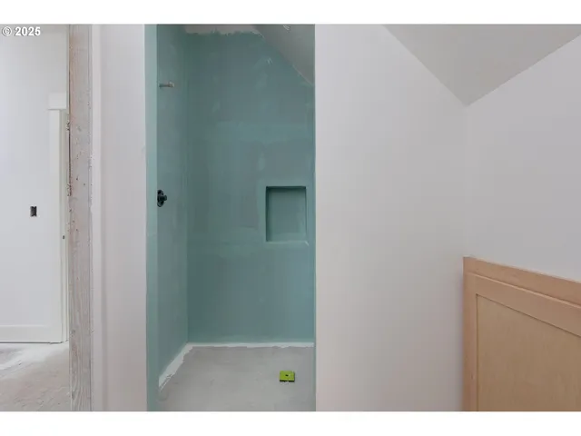 a view of porch with wooden floor