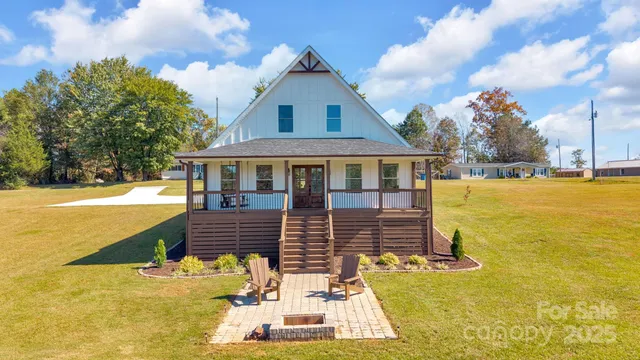 a front view of a house with swimming pool