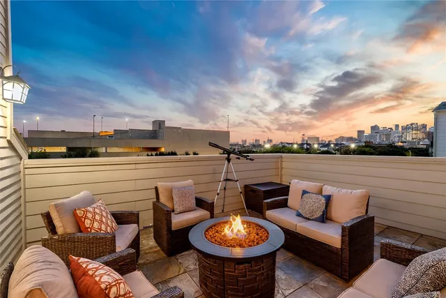 a view of a terrace with furniture