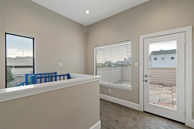 a room with furniture and window