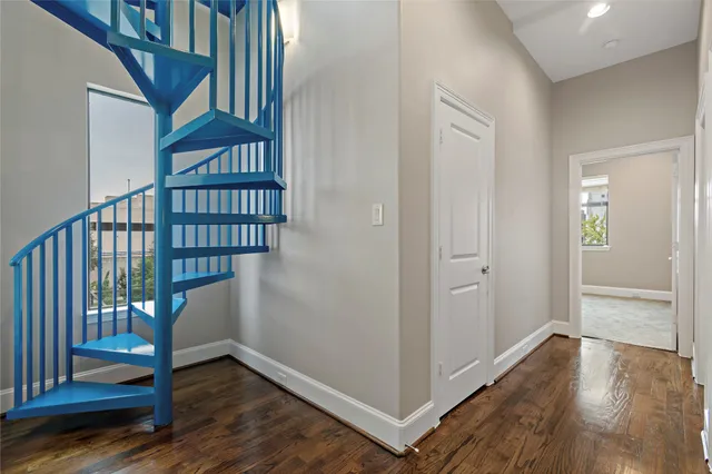 a view of entryway with wooden floor