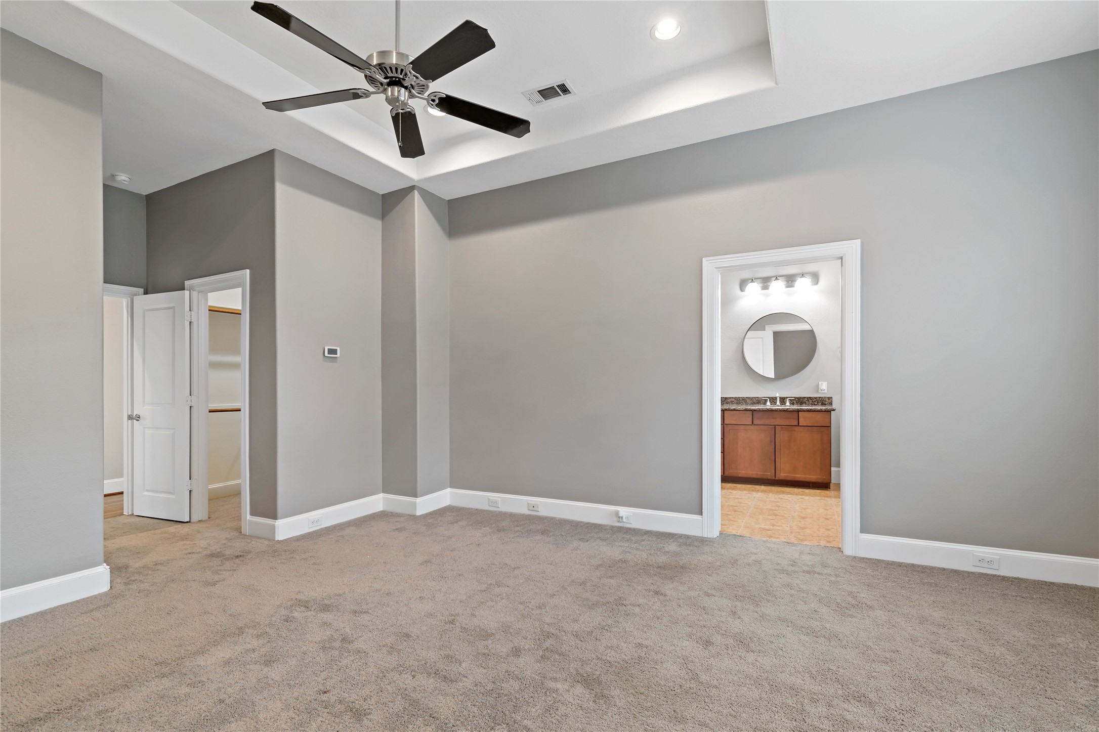 808 Paige Street Houston, TX 77003 - Photo 10 of 23 Step into the inviting main suite bedroom boasting convenient access to a luxurious bathroom and a spacious walk-in closet for ultimate comfort and style. Enjoy the private suite walk-out balcony for relaxation,